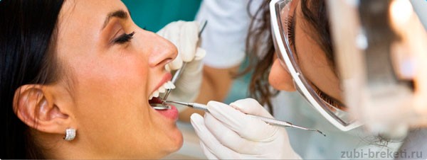 осмотр у стоматолога полости рта во время беременности